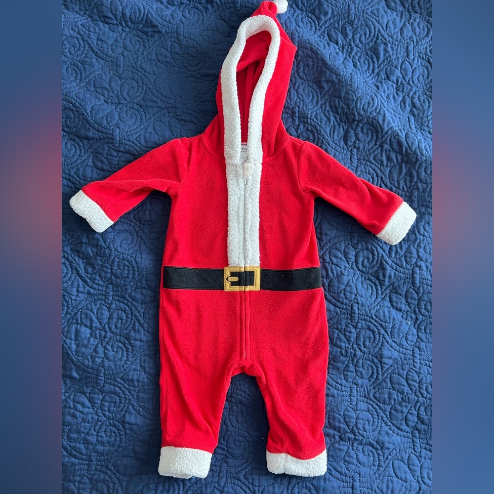 Carters size 6 months Santa Clause one piece footie pajamas.